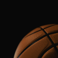 Basketball ball closeup on black background