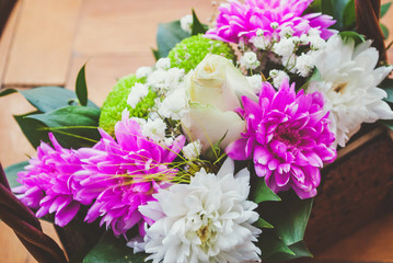 Floral arrangement of roses in a basket, gift for wife, Women's Day