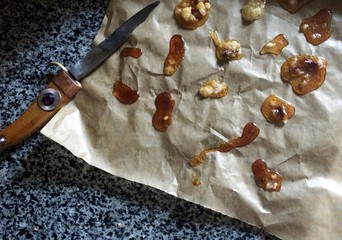 Home sugar caramel fried on pan and on paper