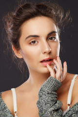 Beauty portrait of young pretty woman in studio