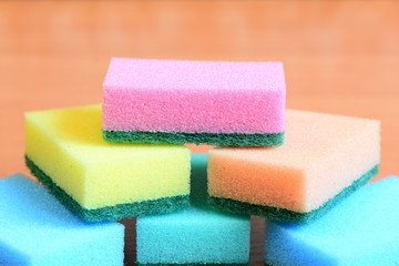 Colorful sponge for cleaning ware and house cleaning. Cleaning sponge with scrub set. Closeup