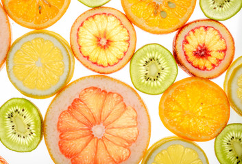 Mixed transparent citrus fruit on white