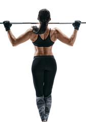 Exercise for the back. Photo of a strong attractive woman doing pull-ups on a white background. Back view.