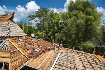 Fototapeta na wymiar Roof tiling by roofer