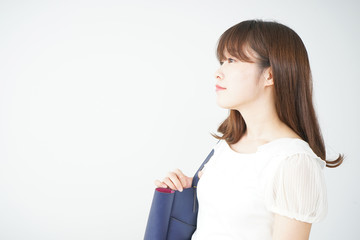 Young woman walking with casual wear