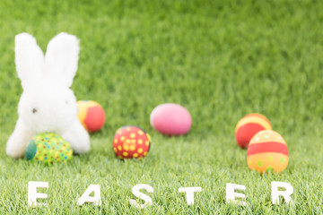 Bunny toys and Easter eggs with text