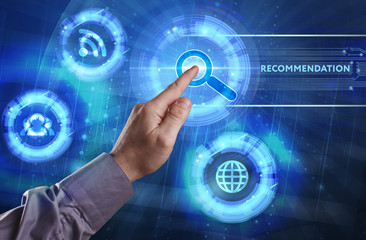Business, Technology, Internet and network concept. Young businessman working on a virtual screen of the future and sees the inscription: Recommendation