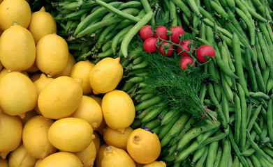 Green beans and lemons at open market