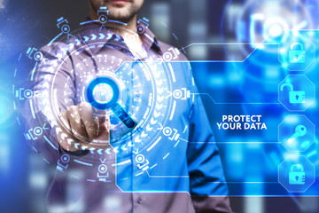 Business, Technology, Internet and network concept. Young businessman working on a virtual screen of the future and sees the inscription: Protect your data