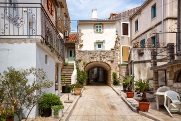 Fototapeta na wymiar Empty street in a small croatian mediterranean town