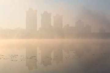 City mist landscape near the river