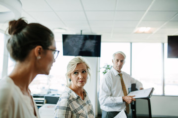 Business people having a informal meeting in modern office