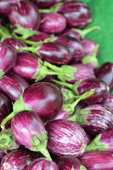 Fresh eggplants for sale in a market