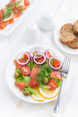 salad with salted salmon, top view