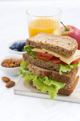 school lunch with sandwich of wholemeal bread, vertical