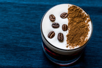 White Russian Cocktail with coffee beans.