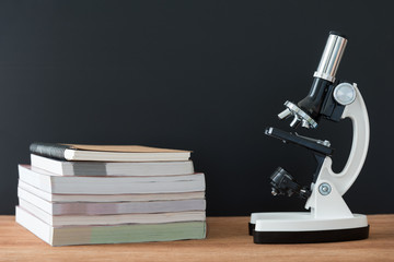 microscope on wooden table