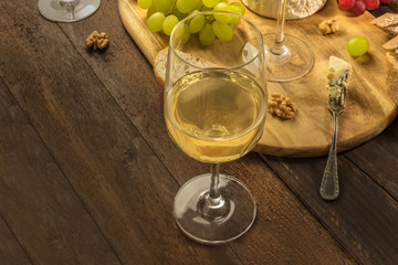 Wine and cheese tasting, with bread and grapes