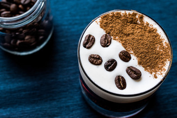 White Russian Cocktail with coffee beans.