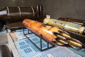 Medium view of captured USAF rocket launching pod with greased tubes on display in Vietnam