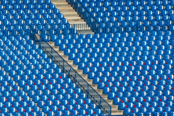 Empty blue seats in a stadium