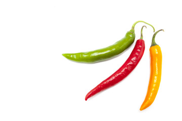 Red, orange and green chili on white background, isolate image