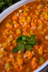 fish with vegetables in tomato sauce