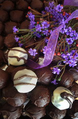 Glazed round candies with violet flowers