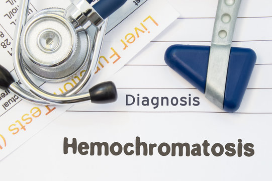 Diagnosis Hemochromatosis. Neurological hammer, stethoscope and liver laboratory test lie on note with title of hereditary disease Hemochromatosis. Concept for neurology and gastroenterology