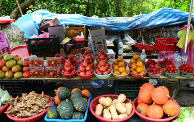 Various vegetables and fruits for sale by the country road in Taiwan. 