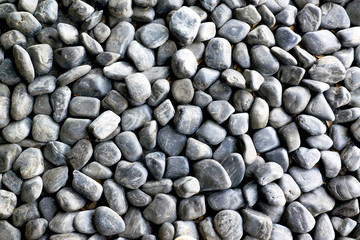 Black pebbles background