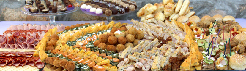 catering banquet table, Buffet with snacks at the outdoor event