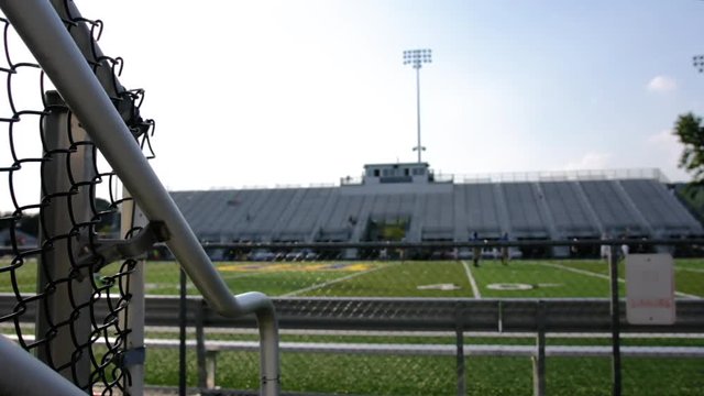 Empty high school football stadium view from the bleachers
