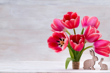 Pink tulips, spring flowers and Easter decoration.