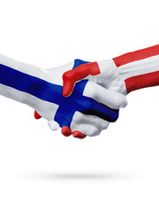 Flags Finland, Denmark countries, partnership friendship handshake concept.