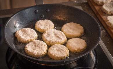 Pancakes are fried in a frying pan