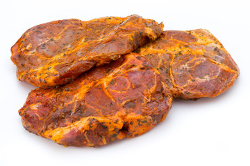 Pork chop, marinated. Isolated on the white background.