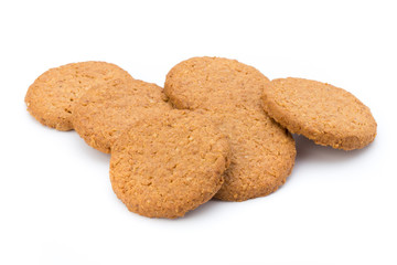 Stacked short pastry cookies isolated on white background.
