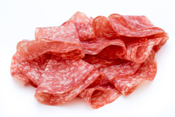 Salami smoked sausage slices isolated on white background cutout.