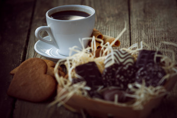 Coffee break, breakfast. Cup of coffee with biscuit cookies