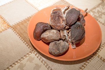 Dried persimmons in plate