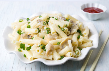 Macaroni pasta with onions and  mushrooms