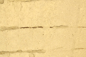 Background from an old concrete wall with visible cracks, space for text