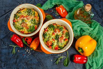 Frittata with broccoli in two ceramic forms