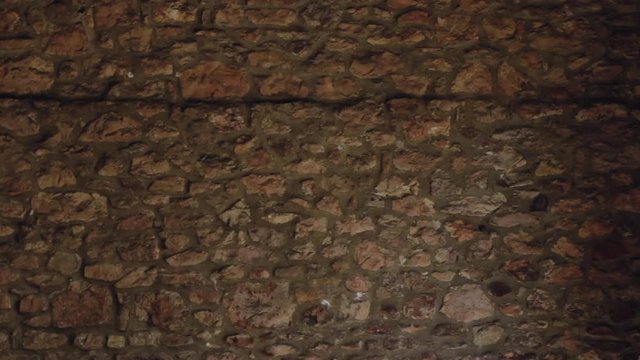 Old stone wall interior of a historic colonial home, background