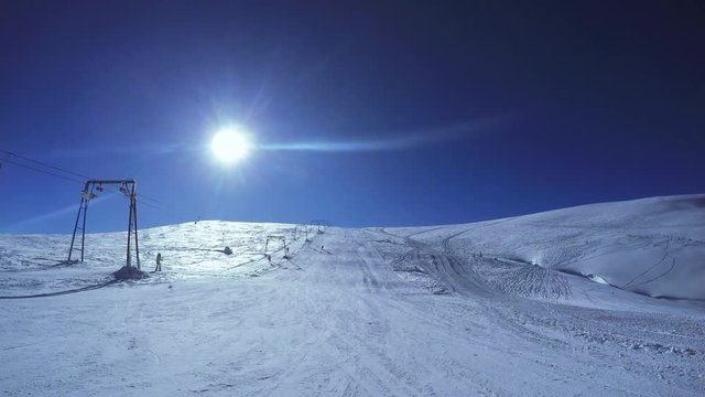 Man Descent on skis from the snow mountains