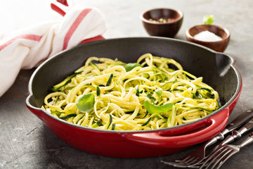 Spiralized zucchini noodles in a cast iron pan