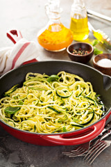 Spiralized zucchini noodles in a cast iron pan