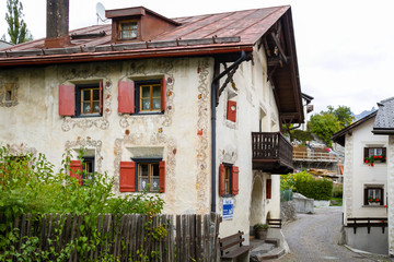 Fototapeta na wymiar Old house in the Scoul, canton Graubünden in Switzerland. 