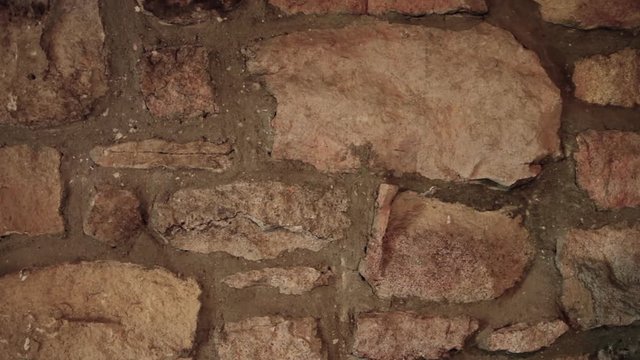 Old stone wall interior of a historic colonial home, background